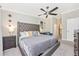 Spacious main bedroom with en-suite bathroom access and stylish decor at 5674 Palmer Circle Dr # 203, Bradenton, FL 34211