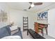Well-appointed office boasts modern art, a sleek desk, and room to relax at 5674 Palmer Circle Dr # 203, Bradenton, FL 34211