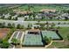 Aerial view of the community tennis and pickleball courts at Lakewood National at 5674 Palmer Circle Dr # 203, Bradenton, FL 34211