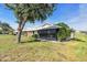 Nice backyard and covered lanai of single-story home at 57 Sandstone Cir, Venice, FL 34293