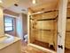Bathroom featuring a glass-enclosed shower, tile walls, and granite vanity at 57 Sandstone Cir, Venice, FL 34293