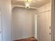 Elegant entryway featuring a chandelier and a decorative archway at 57 Sandstone Cir, Venice, FL 34293