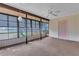 Enclosed lanai provides a relaxing space to enjoy views of nature at 57 Sandstone Cir, Venice, FL 34293