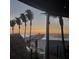 Ocean pier view from a restaurant window at sunset at 57 Sandstone Cir, Venice, FL 34293
