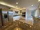 Spacious kitchen featuring stainless steel appliances, granite countertops, and bright recessed lighting at 5760 Howard Creek Rd, Sarasota, FL 34241