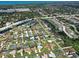 Aerial view of real estate with home circled in a dense neighborhood with water access at 5832 Monroe Rd, Venice, FL 34293