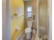 Bright bathroom features a window, shower and wood-look tile flooring at 5832 Monroe Rd, Venice, FL 34293