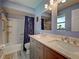 Bathroom with a double sink vanity and shower and bath combination at 5832 Monroe Rd, Venice, FL 34293