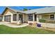 Inviting front exterior of home showcasing a manicured lawn and attractive entryway at 5832 Monroe Rd, Venice, FL 34293