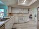 The kitchen has lots of counter space and features white appliances at 5832 Monroe Rd, Venice, FL 34293