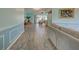 Spacious living room showcasing wood floors, custom trim, and open layout at 5832 Monroe Rd, Venice, FL 34293