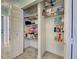 Organized pantry with ample shelving for storage and easy access to household essentials at 5832 Monroe Rd, Venice, FL 34293