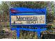 Manasota Beach sign, welcoming visitors to this scenic Sarasota County destination at 5832 Monroe Rd, Venice, FL 34293