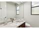 Bathroom features white marble countertops and a stainless steel faucet at 5850 Saddle Oak Trl, Sarasota, FL 34241