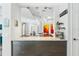 Modern coffee bar with cabinetry, stone countertops, and a view to the dining room at 5850 Saddle Oak Trl, Sarasota, FL 34241