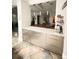 Stylish coffee bar area with plenty of storage and quartz countertops at 5850 Saddle Oak Trl, Sarasota, FL 34241