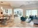 Open concept living and dining room with tile floors at 5850 Saddle Oak Trl, Sarasota, FL 34241