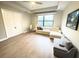 Open living room featuring a couch, chair and small dining table at 5850 Saddle Oak Trl, Sarasota, FL 34241