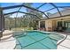 Screened-in pool with hot tub and outdoor furniture at 5850 Saddle Oak Trl, Sarasota, FL 34241