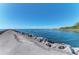 Scenic pier stretching into the ocean, perfect for a leisurely stroll with beautiful blue skies at 5872 Monroe Rd, Venice, FL 34293