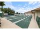 This shuffleboard area includes four separate courts and lounge chairs for guests at 612 Bird Bay S Dr # 308, Venice, FL 34285