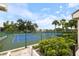 This complex includes a view of the tennis courts from the garden area at 612 Bird Bay S Dr # 308, Venice, FL 34285