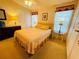 Bedroom featuring neutral decor and cozy furnishings at 615 S Green Cir, Venice, FL 34285