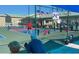 Outdoor pickleball court with players in action at 615 S Green Cir, Venice, FL 34285