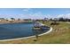 Beautiful waterfront view showcasing boat docks and a serene canal in a picturesque community setting at 615 S Green Cir, Venice, FL 34285