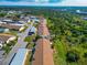 Aerial view of community, landscaping and lush greenery at 6796 Gasparilla Pines Blvd # 18, Englewood, FL 34224