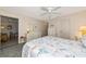 Bedroom with beach-themed bedding, ample drawer space, and comfortable furniture at 6796 Gasparilla Pines Blvd # 18, Englewood, FL 34224