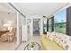 Sun-filled Florida room leading to additional living space, providing seamless indoor-outdoor living at 6796 Gasparilla Pines Blvd # 18, Englewood, FL 34224