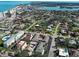 Beautiful property featuring a courtyard pool, palm trees, and convenient parking near a scenic beach town at 701 Barcelona Ave # 101, Venice, FL 34285