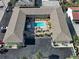 This lovely complex features a refreshing pool, seating area, and well-maintained landscaping at 701 Barcelona Ave # 101, Venice, FL 34285