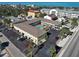 Aerial view of property showing parking and beach nearby at 701 Barcelona Ave # 101, Venice, FL 34285
