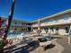 The community pool and patio area offer a relaxing spot for residents to unwind and socialize at 701 Barcelona Ave # 101, Venice, FL 34285