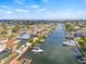 Beautiful waterfront home featuring a private boat dock, boat lift and direct access to the canal at 731 Flamingo Dr, Apollo Beach, FL 33572