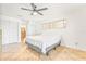 Bedroom featuring neutral paint and tile floors and closet space at 731 Flamingo Dr, Apollo Beach, FL 33572