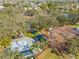 Aerial view of a colorful community playground with slides, swings, and ample play space at 731 Flamingo Dr, Apollo Beach, FL 33572