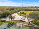 Aerial of community skate park featuring ramps, rails and palm trees under a clear sky at 731 Flamingo Dr, Apollo Beach, FL 33572