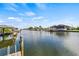 Peaceful view of the waterway lined with homes and docks at 731 Flamingo Dr, Apollo Beach, FL 33572