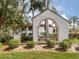 Summer Green community entrance with landscaping at 800 Capri Isles Blvd # 124, Venice, FL 34292