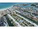 Breathtaking aerial view of waterfront homes, private boat docks, community pool and beautiful beaches nearby at 832 Whitecap Cir # 5, Venice, FL 34285