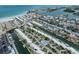 The aerial view showcases a community of waterfront homes with access to the Gulf at 832 Whitecap Cir # 5, Venice, FL 34285