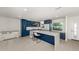 Bright and airy kitchen with a large island and plenty of counter space at 832 Whitecap Cir # 5, Venice, FL 34285