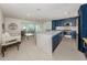 Modern kitchen with a large island, stainless steel appliances, and open layout at 832 Whitecap Cir # 5, Venice, FL 34285