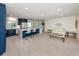 Open-concept living space combining the kitchen and living room at 832 Whitecap Cir # 5, Venice, FL 34285