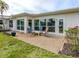 Patio with outdoor seating, offering serene outdoor relaxation and lawn at 832 Whitecap Cir # 5, Venice, FL 34285