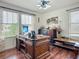 Office features a large wooden desk, window and stylish decor at 9019 39Th Street Cir E, Parrish, FL 34219
