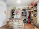 Walk-in closet with custom shelving, drawers, and center island at 9019 39Th Street Cir E, Parrish, FL 34219